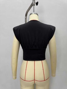 Elegant black sleeveless V-neck vest with padded shoulders and elastic waist design