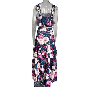 Detail of navy floral print two-piece set with ruffled tiered skirt and cropped camisole top