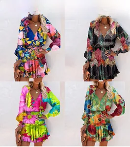 Détails de quatre robes colorées à col en V avec taille haute, volants et manches longues
