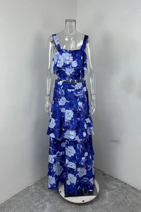 Detail showing royal blue floral print fabric and tiered skirt structure of the summer set