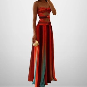 Sultry gradient strapless maxi dress with cutout front and flowing chiffon fabric