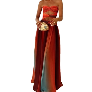 Sexy strapless maxi dress with cutout waist and sunset gradient pleats in orange and red