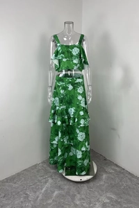 Detail of green floral crop top and tiered maxi skirt set with bohemian ruffles