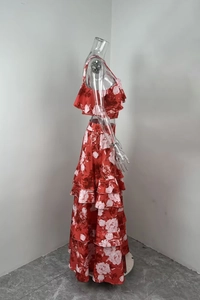 Detailed side view of floral ruffled camisole and layered maxi skirt set for women