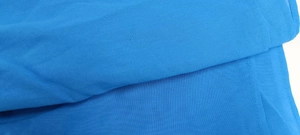 Macro view of royal blue mesh fabric showing fine texture and professional stitching
