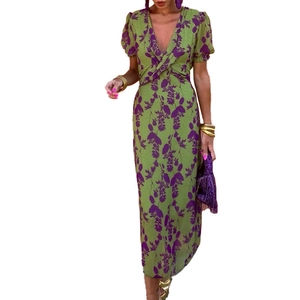 Elegant green floral short sleeve V-neck midi dress with stylish waist twist detail