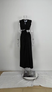 Detail of black cut-out waist knot design on a sleek sleeveless V-neck maxi dress