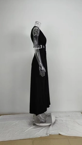 Detail view of the sexy side cutout and knotted waist on this black V-neck maxi dress