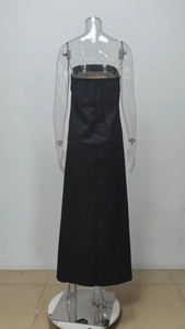 Back view of a sleek black strapless maxi dress with a slim fit silhouette and smooth finish