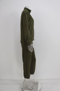 Side view of olive green two-piece tracksuit featuring a half-zip sweatshirt and joggers