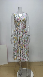 Detailed view of the V-neckline and bow tie on this elegant floral sleeveless dress