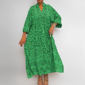 Women's green floral V-neck maxi dress with long sleeves and geometric print patterns