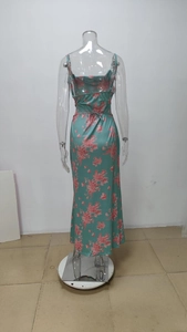 Detail view of backless floral satin maxi dress with adjustable lace-up waist