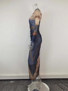 Detail of sheer mesh fabric with blue and brown tie-dye gradient on slim fit dress