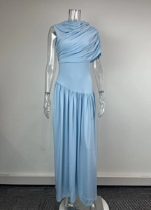 Detail of light blue sleeveless maxi dress showing elegant draped neckline and waist pleats