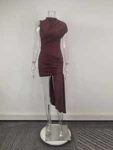 Detail of burgundy ruched asymmetrical dress with high neck and side draped ribbon accent