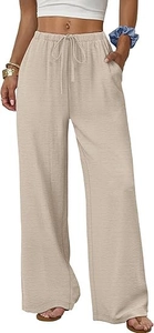 Detailed view of apricot wide-leg pants featuring elastic drawstring waist and side pockets