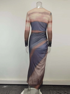 Detail view of a slim-fit long-sleeved dress with gradient print and side waist ruching