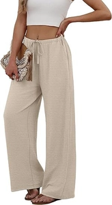 Detail of high-waisted wide-leg linen pants with elastic drawstring and side pockets