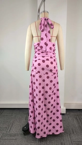 Pink polka dot halter maxi dress with backless design and elegant neck bow tie detail