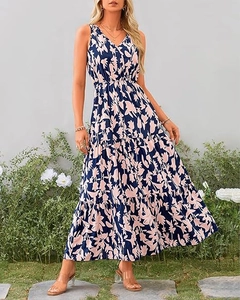 Detail of V-neck sleeveless floral maxi dress with elastic waist and tiered skirt layers