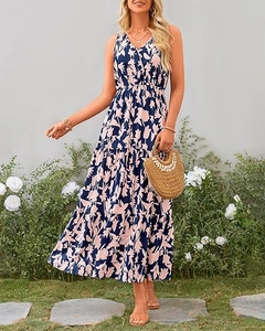 Detail of V-neck tiered maxi dress with floral print and elastic waist for summer