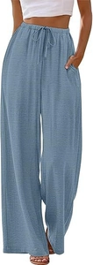 Detail of high-waisted wide-leg pants featuring drawstring waist and blue textured fabric