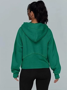 Back view of a cropped dark green half-zip hoodie with premium fleece fabric and seams