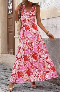 Macro shot of a floral summer maxi dress featuring a V-neck and tiered bohemian skirt layers