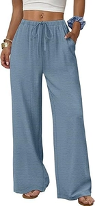 Detail of light blue wide-leg trousers featuring drawstring waist and practical pockets