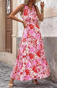 Close-up of summer floral V-neck maxi dress with ruffled skirt and vibrant pink prints