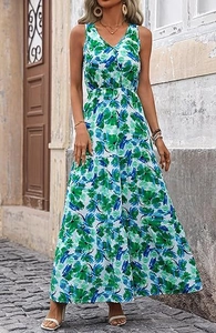 Detail of V-neck tiered maxi dress featuring vibrant green and blue tropical leaf prints