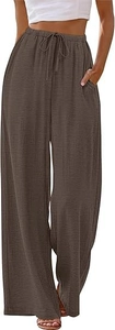 Detail of high waisted dark brown wide leg trousers with adjustable drawstring waist
