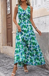 Detail of tiered floral maxi dress with V-neckline and elegant green botanical print