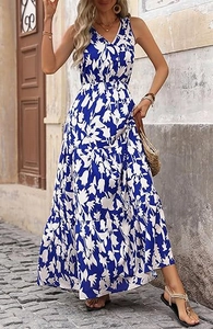 Detail of V-neck sleeveless floral maxi dress with layered skirt in a summer resort style