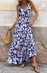 Detail of blue and white floral print on a V-neck sleeveless tiered maxi dress