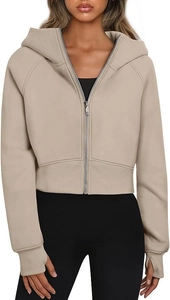 Close-up of cropped zip-up hoodie featuring ribbed cuffs with functional thumbholes