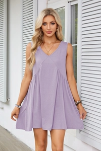 Detail view of light purple V-neck sleeveless dress with pleated waist and side pockets
