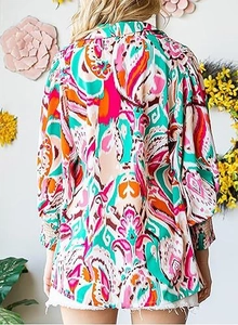 Detail of bohemian paisley print blouse with elegant lantern sleeves and back view