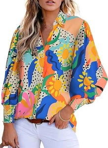 Close-up of abstract print long sleeve shirt with v-neckline and lantern sleeve detail