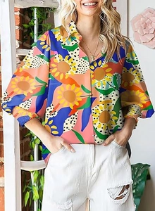 Detail of floral lantern sleeves and colorful sunflower print on women long sleeve shirt
