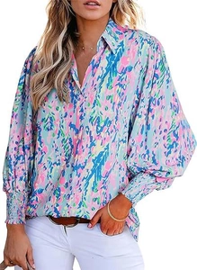 Close-up of lantern sleeves with elastic cuffs on a colorful floral print blouse