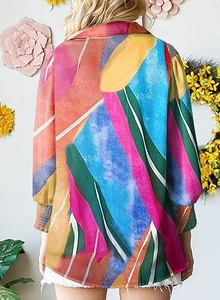 Detailed back view of abstract colorful print blouse with elasticated lantern cuffs