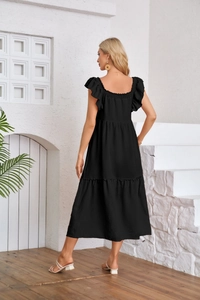 Detail of square neck back and layered ruffle sleeves on a black summer dress