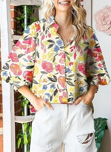 Detailed view of floral long sleeve shirt with classic collar and lantern cuff design