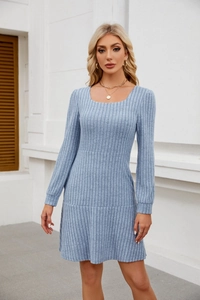 Detailed texture of light blue square neck ribbed knit mini dress on a model