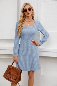 Detail of light blue square neck ribbed knit dress showing fabric texture and pockets