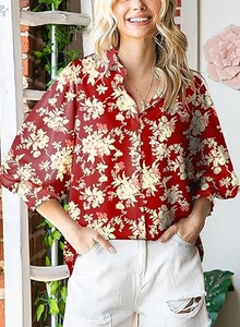 Detail of a floral print long sleeve shirt featuring a lapel collar and buttoned placket