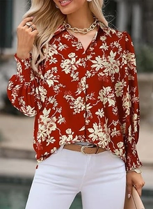 Detailed close-up of brick red floral shirt featuring classic lapel and elastic cuffs