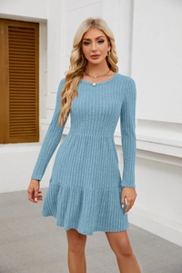 Close-up of light blue ribbed knit dress showing crew neck and slim fit texture